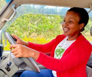 Vicky Mbofu driving for her work